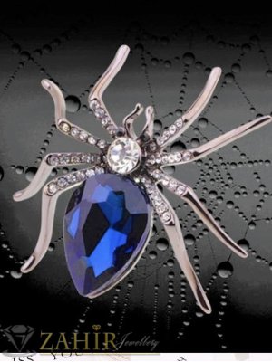 Ефектна паяк брошка с голям тъмносин кристал и малки бели камъни,размери 6 на 5 см, сребриста основа - B1288